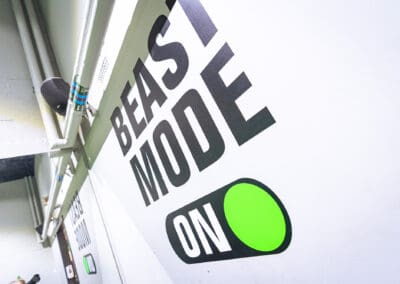 A wall sign that says 'beast mode ON' at Hazel Grove Sports Centre