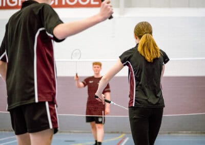 Children play badminton at Hazel Grove Sports Centre